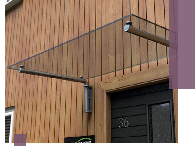 Стеклянные козырьки на входы и фасады в Дальнегорске